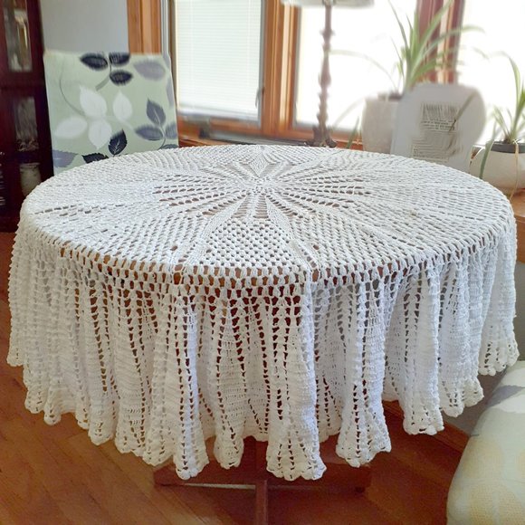 Vintage Boho crocheted round tablecloth. White with very pale yellow border